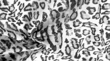 İpek kumaştan siyah beyaz leopar desenli. Leopar desenli hafif ipek senin tasarımına mükemmel uyacak, şık görünüyor ve kaba değil! Doku, arkaplan, desen