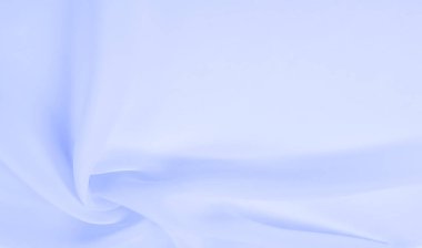Kusursuz arkaplan dokusu - soluk mavi ipek. Bu basit ama sofistike kumaşın nüanslarının kendi adına konuşmasına izin ver. Yumuşak, kumlu doku, hafif parlak mavi renk.