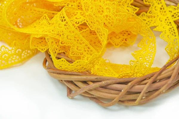 Add pops of color to any outfit with a yellow lace ribbon. Give new life to old clothes with this trendy finish. Easy to sew on or stick to clothes and accessories.