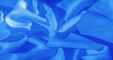 Doku, arkaplan, desen, saf açık mavi ipek kumaş Düşes 'in gerçekten güzel ipek kumaşı. Tasarımın için mükemmel, özel durumlar için düğün davetiyeleri..