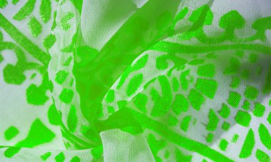 İpek kumaş, yeşil kumaş. Beyaz arka planda zarif çiçeklerin gölgeleri, Paisley 'nin fotoğrafı. Doku, desen, koleksiyon