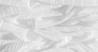 İpek kumaş. Beyaz buruşuk kumaşın dokusu. Beyaz buruşuk, dalgalı yüzey dokusu. 