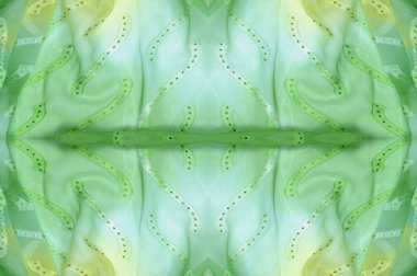 Kusursuz kaleydoskop. Kumaş ipek yeşil-mavi gözlükler. Canlı renkler ve deniz tarağı şekilleri, sarı, mavi ve yeşil geometrik ipek krep de chine renginde gerçekten eşsiz bir krep oluşturur..