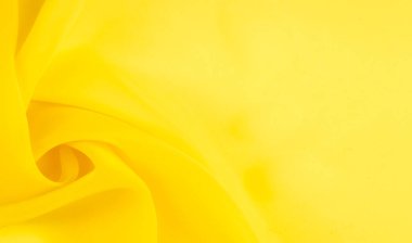 arkaplansız doku - sarı ipek. Soluk sarı renkli birinci sınıf ipek organza fevkalade bir kumaştır, hem kendi başına güzeldir hem de vurgu açısından bir aksesuardır..