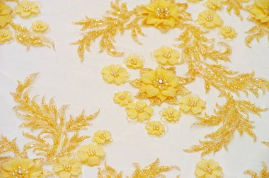 Kartpostallar için altın sarısı dantel arka plan. Posterler. Dokular. Eski dantel çizgileri projelerinize kaliteli doku örnekleri ve çeşitli yaratıcı projeler ekler ekler.