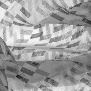 Siyah geometrik eşkenar dörtgen şekilli beyaz ipek kumaş. Karanlık. Geçmişi. Şablon.