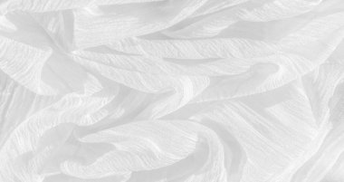 İpek kumaş. Beyaz buruşuk kumaşın dokusu. Beyaz buruşuk, dalgalı yüzey dokusu. 