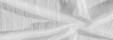 İpek kumaş. Beyaz buruşuk kumaşın dokusu. Beyaz buruşuk, dalgalı yüzey dokusu. 