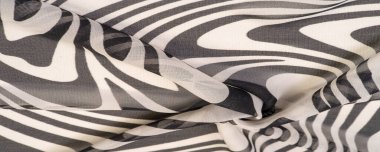 İpek kumaş, siyah beyaz soyut çizgiler. Soyut siyah beyaz desenli büyülü bir şekil. Retro modern dekor, tekstil sanatı, tasarım, doku, arkaplan, kalıp