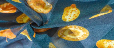 İpek kumaş, mavi ve sarı sonbahar yaprakları. Doku, arkaplan deseni