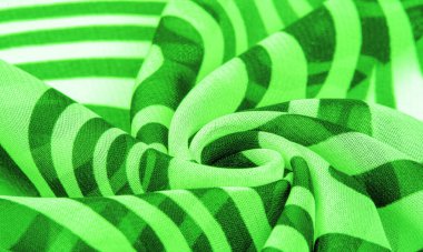 İpek kumaş, yeşil ve beyaz soyut çizgiler. Soyut beyaz ve yeşil desenlerin sihirli formu. Retro modern dekor, tekstil sanatı, tasarım, doku, arkaplan, kalıp