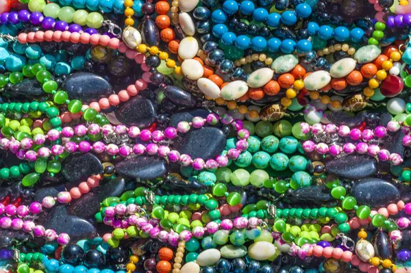 Seamless texture of semi-precious stones. saying Beads pendants jewelry. Semi-precious stones are hard gemstones created organically. including lava or ocean hotspots, mines and shells.