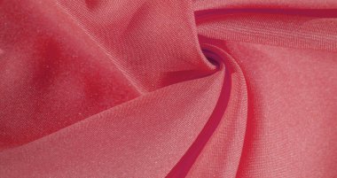 İpek kumaş yakut kırmızısıdır. Renkli ipek kumaşın dokusu arka plan olarak kullanılabilir