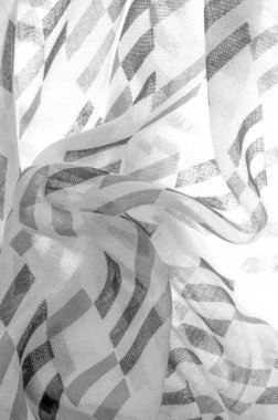 Siyah geometrik eşkenar dörtgen şekilli beyaz ipek kumaş. Karanlık. Geçmişi. Şablon.