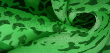 Yeşil-beyaz çizgili ipek kumaş, Afrika tarzı zebra derisi. Tasarımcı için, tasarımın taslağı, dekoratörün çevresi. Arkaplan dokusu koleksiyonu