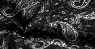 Siyah arka planda desenli siyah beyaz desen. Kovboyların ve motorcuların bandanalarını dekore etti. Beatles tarafından popüler hale getirildi, rock 'n roll çağına öncülük etti..