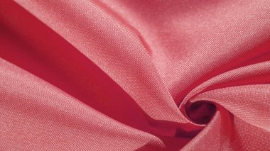İpek kumaş yakut kırmızısıdır. Renkli ipek kumaşın dokusu arka plan olarak kullanılabilir