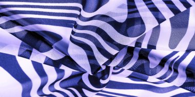 İpek kumaş, mavi ve beyaz soyut çizgiler. Soyut mavi ve beyaz desenlerin sihirli şekli. Retro modern dekor, tekstil sanatı, tasarım, doku, arkaplan, kalıp