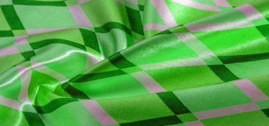 Yeşil karelerin geometrik şekilli ipek kumaşı. Soyut arkaplan, boş şablon. Basit geometrik desen, duvar kağıdı, doku, arkaplan.