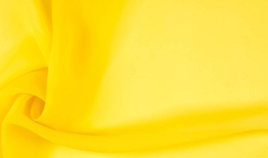 arkaplansız doku - sarı ipek. Soluk sarı renkli birinci sınıf ipek organza fevkalade bir kumaştır, hem kendi başına güzeldir hem de vurgu açısından bir aksesuardır..