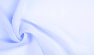 Kusursuz arkaplan dokusu - soluk mavi ipek. Bu basit ama sofistike kumaşın nüanslarının kendi adına konuşmasına izin ver. Yumuşak, kumlu doku, hafif parlak mavi renk.