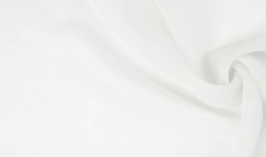 Doku - beyaz ipek. Bu antika beyaz ipek kumaşla klasik bir estetik elde et. Elinde pürüzsüz ve çıtır çıtır, zengin fildişi rengi göz kamaştırıcı bir parıltı yaratır..