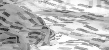 Siyah geometrik eşkenar dörtgen şekilli beyaz ipek kumaş. Karanlık. Geçmişi. Şablon.