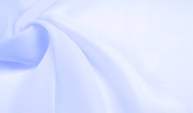Kusursuz arkaplan dokusu - soluk mavi ipek. Bu basit ama sofistike kumaşın nüanslarının kendi adına konuşmasına izin ver. Yumuşak, kumlu doku, hafif parlak mavi renk.