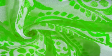 İpek kumaş, yeşil kumaş. Beyaz arka planda zarif çiçeklerin gölgeleri, Paisley 'nin fotoğrafı. Doku, desen, koleksiyon