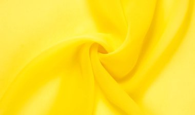 arkaplansız doku - sarı ipek. Soluk sarı renkli birinci sınıf ipek organza fevkalade bir kumaştır, hem kendi başına güzeldir hem de vurgu açısından bir aksesuardır..