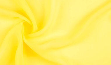 arkaplansız doku - sarı ipek. Soluk sarı renkli birinci sınıf ipek organza fevkalade bir kumaştır, hem kendi başına güzeldir hem de vurgu açısından bir aksesuardır..