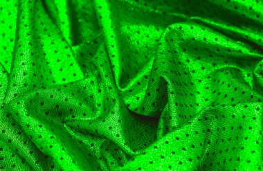 Küçük puantiyeli metalik parıltılı kumaş. Yeşil renk, çarpıcı bir metalik kumaş tasarımı ile bir sonraki etkinliğinizin ilgi odağı olacak. İnanılmaz pürüzsüz ve canlı bir parıltı sunacak.