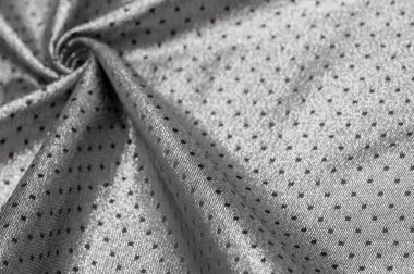 Küçük puantiyeli metalik parıltılı kumaş. Siyah. Bazen bir kumaş eklemeniz gerekir, bizim ipeklerimiz gibi..