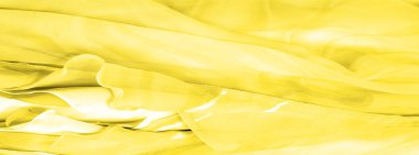 Kusursuz kaleydoskop, sarı ipek. Şık bir sunum için ihtiyacın olan tek şey güneşli sarı ipek bir musluk..