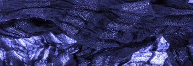 Doku. Koyu mavi kumaş. Noel kadınsı kraliyet partisi için dekoratif bir altyapı. Şatafatlı, deri desenli duvar kağıdı desenli. Doğum günü davetiyeleri için arka plan. Açık pastel renk