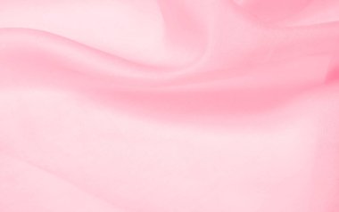 Bulanık pembe ipek kumaş. Kalabalıktan canlı bir renkle uzaklaşın. Işığı yansıtan parlak dalgalar, enfes sofistike dalgalar. Bu sıcak pembe ipek krep de chine.