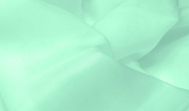 Bulanık yeşil ipek kumaş. Bu ipek ipte parlak bir cazibe çiçek açıyor. Kelly Green rengi çekici ve neşeli, ve hafif parlak yüzeyi enerjisi ve şık tonu ile uyumlu..