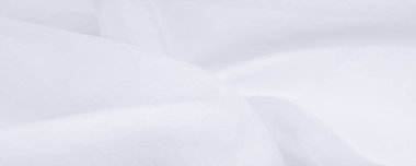 Bulanık, beyaz ipek kumaş. Organza kumaşları şeffaf ve çok hafiftir ama aynı zamanda dayanıklıdır ve berrak kumaşlarla kaplıdır. Projeleriniz gibi büyük girişimler için.