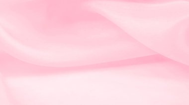 Bulanık pembe ipek kumaş. Kalabalıktan canlı bir renkle uzaklaşın. Işığı yansıtan parlak dalgalar, enfes sofistike dalgalar. Bu sıcak pembe ipek krep de chine.