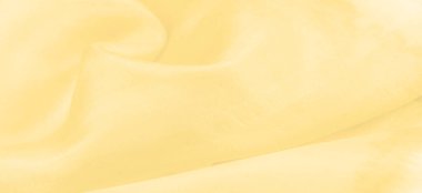 Bulanık sarı ipek kumaş. Olağanüstü bir proje için ihtiyacınız olan tek şey güneşli sarı ipek bir musluktur. Çoğu periden daha ince ve hafiftir. Görünüşü tamamlayan sert bir perdesi vardır..