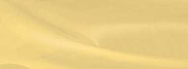 Bulanık sarı ipek kumaş. Kremsi bej rengini ve ışıldayan saten kaplamasını gösteriyor. Hala şifonun ve akıcı kumaşın tipik tazeliğini koruyor..