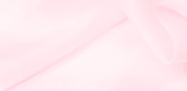 Bulanık pembe ipek kumaş. Kalabalıktan canlı bir renkle uzaklaşın. Işığı yansıtan parlak dalgalar, enfes sofistike dalgalar. Bu sıcak pembe ipek krep de chine.