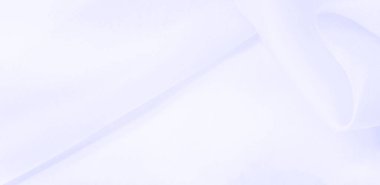 Bulanık mavi ipek kumaş. Bu ipek kumaşla moda denizine dal. Dokularla dolu, hoş ve kaba bir el, kendi görsel tahıllarıyla birleşmiş..