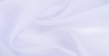 Bulanık, beyaz ipek kumaş. Organza kumaşları şeffaf ve çok hafiftir ama aynı zamanda dayanıklıdır ve berrak kumaşlarla kaplıdır. Projeleriniz gibi büyük girişimler için.