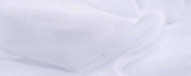 Bulanık, beyaz ipek kumaş. Organza kumaşları şeffaf ve çok hafiftir ama aynı zamanda dayanıklıdır ve berrak kumaşlarla kaplıdır. Projeleriniz gibi büyük girişimler için.