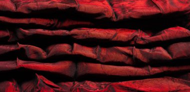Kırmızı kumaş. Zengin bir doku, güzel kaba bir el ve kendi görsel tanecikleri. Değişik çizgileri olan taze, esnek ve basit bir malzeme tasarımın için mükemmel bir seçim..