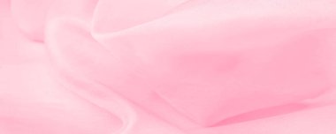 Bulanık pembe ipek kumaş. Kalabalıktan canlı bir renkle uzaklaşın. Işığı yansıtan parlak dalgalar, enfes sofistike dalgalar. Bu sıcak pembe ipek krep de chine.