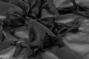 Doku. Geçmişi. Geçmişi. Siyah gri saten kumaş dokusu. Lüks parlak. Soyut ipek kumaş arka plan..