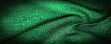 Saf koyu yeşil şifon ipeği, zümrüt soyut arka plan. Yeşil kumaş yakın plan. - Yumuşak şeffaf bir kumaştır. Yumuşak pürüzlüdür (mat, krep) çünkü bükülmüş iplik kullanılır. doku