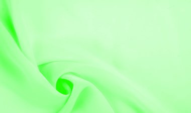 Doku - soluk yeşil ipek. Bu kumaşı herhangi bir mevsim için sıradan bir görünüme dönüştürebilirsin. Yumuşak siluetlere kolayca akabilen esnek, akışkan kumaşlar her şeyi yaratmanızı sağlar..